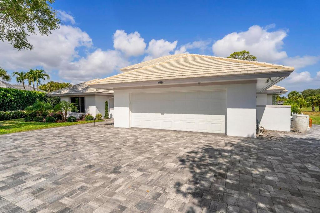 Photo of 5703 SE Glen Eagle Way, Stuart, FL 34997 (MLS # R11085728)