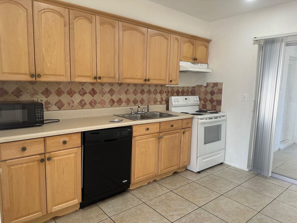 Photo of 1410 SE 3rd Terrace, Deerfield Beach, FL 33441 (MLS # F10475076)