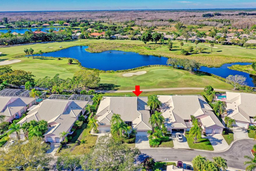 Strategically located in prestigious PGA National Resort, this spectacular one-story, 2,200 sq. ft. home offers luxurious, effortless living. Designed for comfort and elegance, the residence features three bedrooms and two full bathrooms, including a spacious owner's suite with two custom walk-in closets, ensuite bath, an at-grade walk-in shower, and a private commode.
Step directly from the primary suite into a private heated outdoor spa, complete with all new plumbing equipment and new spa heater—your own serene retreat. Soaring 12-foot ceilings welcome you through the foyer and extend throughout the main living areas, enhancing the home's open and airy feel. The kitchen is complemented by a multitude of custom cabinetry and a stylish butler's bar conveniently located between the kitchen and foyer. A designated multiple seating dining room offers breathtaking panoramic golf and water views, where sunsets and local wildlife create a stunning backdrop.

The living area opens to a screened-in porch, ideal for relaxing evenings with family and friends. Outdoors, the pool area overlooks expansive golf and water views and features a new pool heater and updated pool equipment, perfect for entertaining or quiet enjoyment.

This turnkey home is offered fully and professionally furnished, showcasing luxury natural oak flooring throughout and meticulous attention to design and detail. HOA benefits include WiFi/internet, cable, exterior painting, and roof replacement, providing true peace of mind along with the security of a double gated community for your safety and convenience to major transportation such as Palm Beach International, Rt. 95, the Florida Turnpike and Brightline train to Orlando.  Community owners have the option to join the PGA National Resort, however it is not mandatory.
Owners have added two new pool heaters, fresh painted fencing, new porch screening, and new spa plumbing.