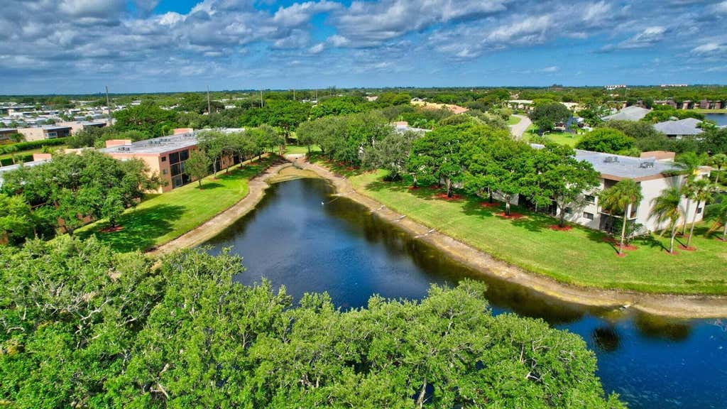 Photo of 15461 Pembridge Drive #201, Delray Beach, FL 33484 (MLS # R10926500)