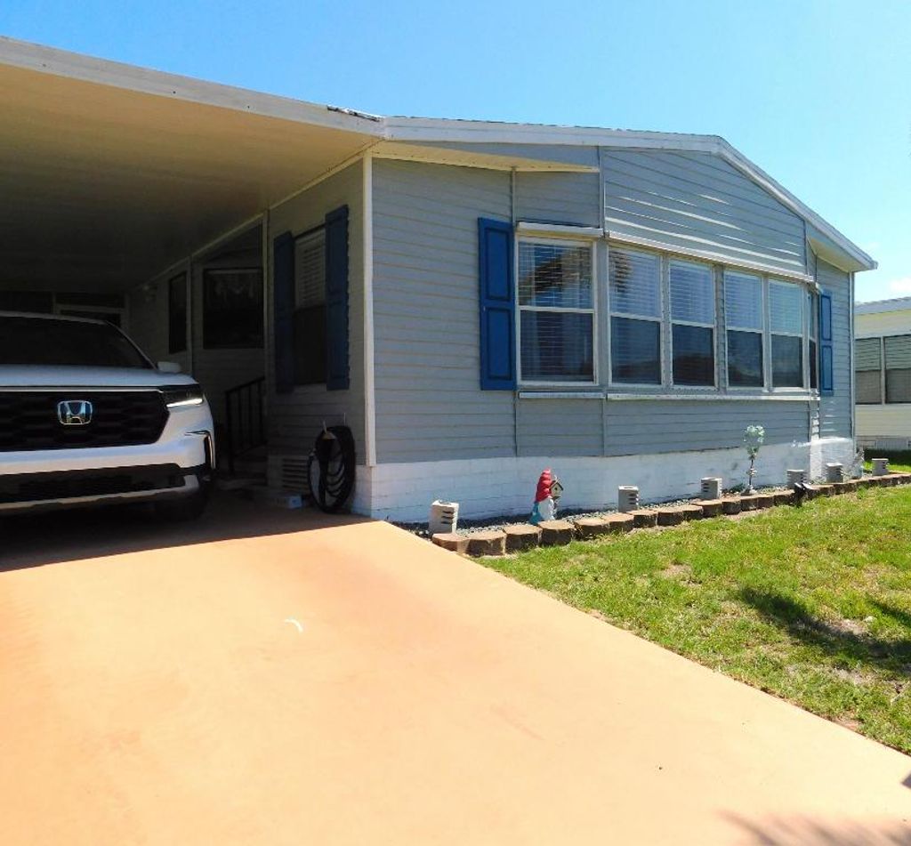 Photo of 514 Hemingway Terrace, Fort Pierce, FL 34982 (MLS # R11100463)