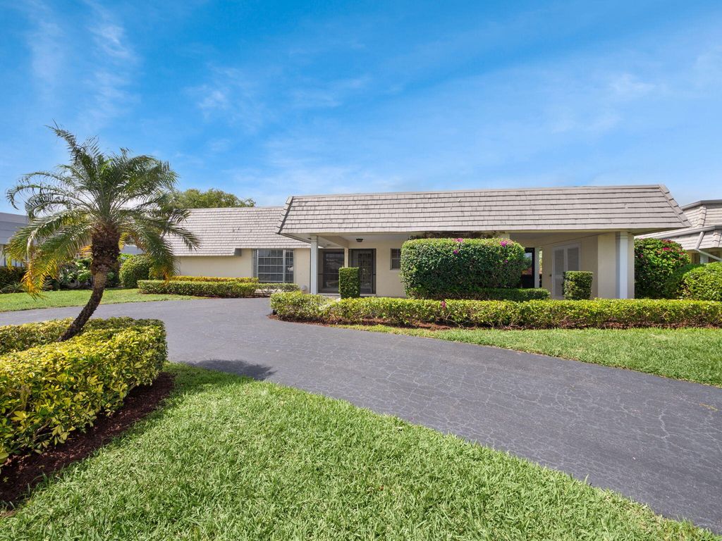 Photo of 379 Villa Drive S, Atlantis, FL 33462 (MLS # R10972310)