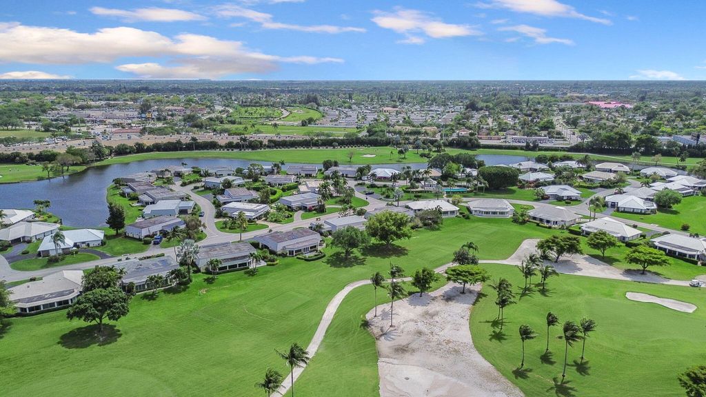 Photo of 379 Villa Drive S, Atlantis, FL 33462 (MLS # R10972310)