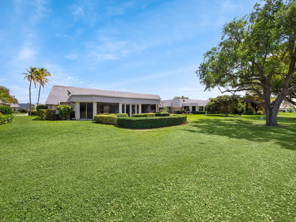 Photo of 379 Villa Drive S, Atlantis, FL 33462 (MLS # R10972310)