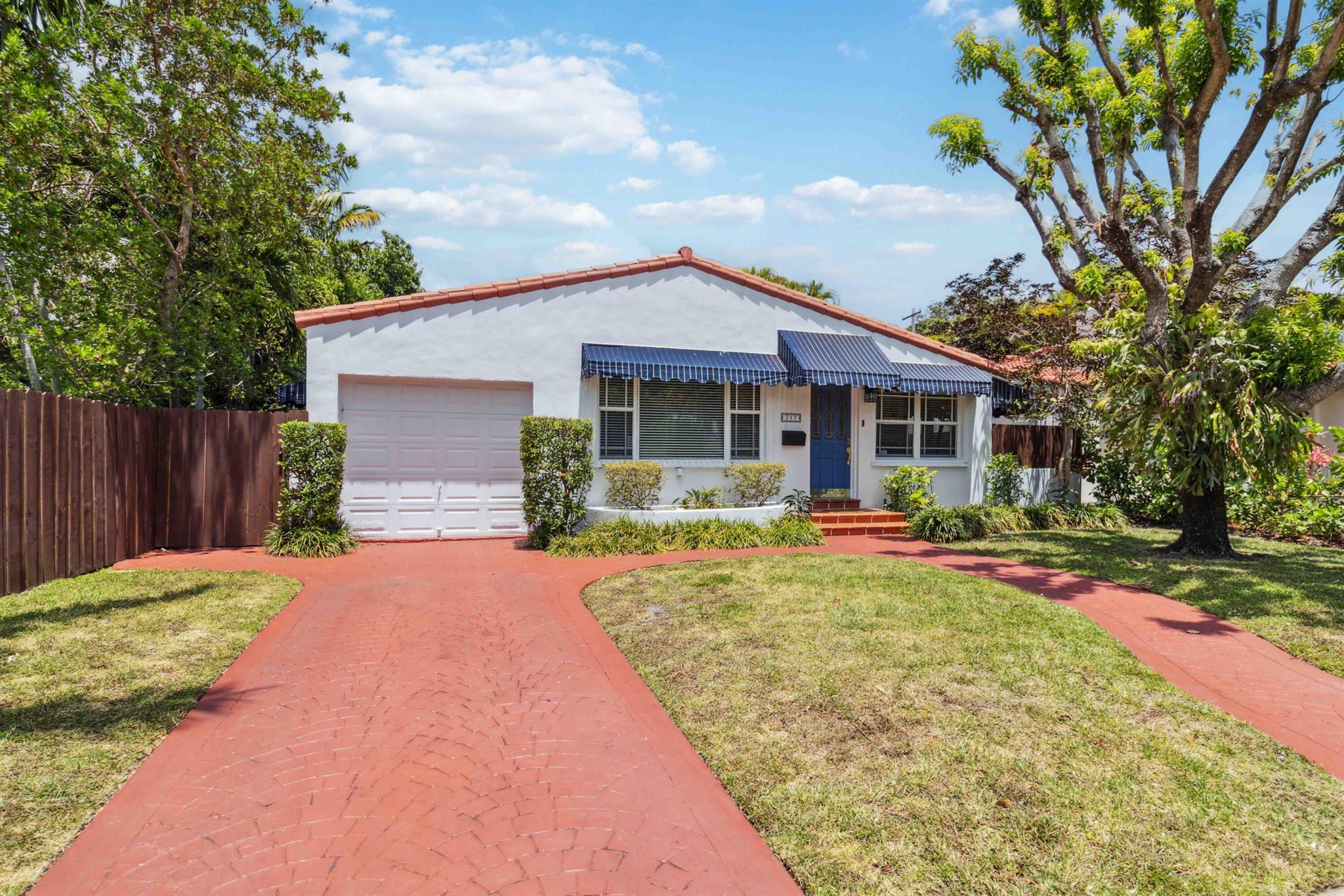 Located in one of Miami's most sought-after gated communities where the HOA is optional, this charming 1936 home in Belle Meade offers the perfect blend of historic character, modern updates, and long-term investment potential. With 3 bedrooms, 2 updated bathrooms, and 1,541 square feet of living space, this property is fully leased through February 2026, providing immediate rental income in a stable, appreciating market. Inside, the home features refinished wood flooring throughout, a renovated kitchen with modern appliances, and updated bathrooms--ensuring low maintenance and tenant satisfaction. The 2020 AC unit adds efficiency, while awnings and a fully fenced yard help minimize expenses and offer additional peace of mind.