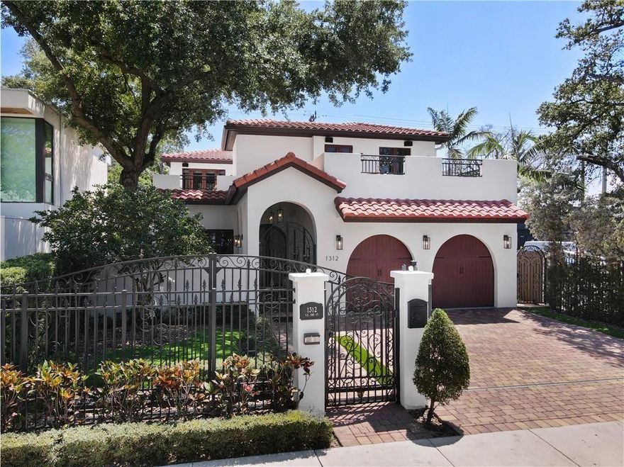LIVE THE LAS OLAS LIFESTYLE IN THIS STUNNING WALLED & GATED SPANISH-MODERN RETREAT! JUST STEPS FROM THE CITY’S BEST DINING, SHOPS & NIGHTLIFE, THIS HOME OFFERS ULTIMATE PRIVACY AND TIMELESS DESIGN. ENJOY SOARING CEILINGS, PORCELAIN FLOORS & A CHEF’S DREAM KITCHEN WITH SUB-ZERO APPLIANCES, QUARTZITE COUNTERS & A 60” GAS RANGE. ENTERTAIN IN YOUR PRIVATE COURTYARD WITH SPA & COVERED TERRACES OR RELAX ON YOUR BALCONY UNDER THE PALMS. TWO-CAR GARAGE, SMART UPGRADES & TOP-RATED SCHOOLS NEARBY. RARE DOWNTOWN LUXURY LIVING — WALK EVERYWHERE, LOVE WHERE YOU LIVE!