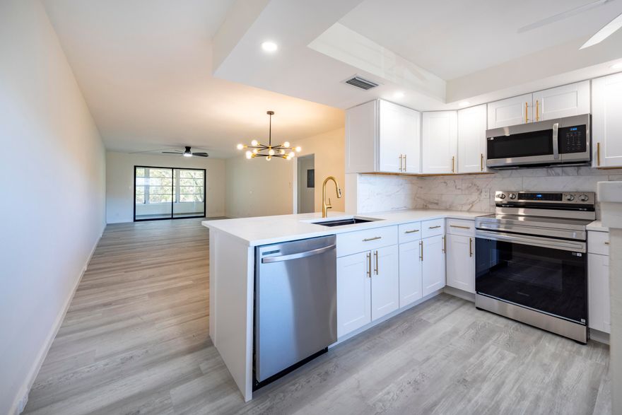 Positioned on the third floor with calm pool views, this 2-bedroom, 2-bath residence at 2303 Lucaya Lane N #3 has been completely taken down and rebuilt just months ago. Spanning 1,156 square feet, the home now delivers a level of finish and day-to-day livability that's rarely found within the community.  From the moment you walk in, it feels different. The design is clean, cohesive, and intentional—every detail aligned to create a space that feels elevated, not pieced together. Unlike many units that stop at surface-level improvements, this renovation went deeper, with thoughtful upgrades behind the walls to match what you see in front of you. The result is a true move-in-ready home, without the typical question marks. Natural light carries through the main living areas, enhanced by the third-floor positioning and open pool views that bring both privacy and a sense of retreat. The kitchen has been fully reimagined with modern finishes and functionality, while both bathrooms reflect the same level of consistency and care. The primary suite offers generous space and storage, making it equally suited for full-time living or a seasonal escape.  Function meets peace of mind here as well. Hurricane protection is in place with a combination of impact elements and shutters, offering security during storm season and added confidence year-round. Assigned parking is included, with common laundry conveniently located nearby.  The building itself adds another layer of value. Built in 1981, the community is financially stable, well-managed, and free of special assessments. The $697 monthly HOA reflects ongoing maintenance and operational strength—an important factor in today's condo market where financial clarity matters more than ever.  This is a 55+ community designed around ease, connection, and simplicity. For buyers looking to downsize, relocate, or secure a winter residence in South Florida, this home removes the usual friction—no renovation timelines, no construction surprises, no uncertainty.  Priced at $195,000, it stands as a compelling opportunity. Fully renovated units of this scale and quality are rarely available at this level, especially within a community that offers both stability and lifestyle.  Everything has already been done.  Now it's simply a matter of stepping in and enjoying it.