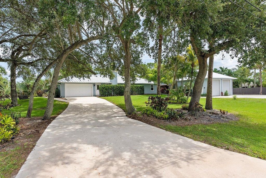 Photo of 15370 69th Drive N, Palm Beach Gardens, FL 33418 (MLS # R10898157)