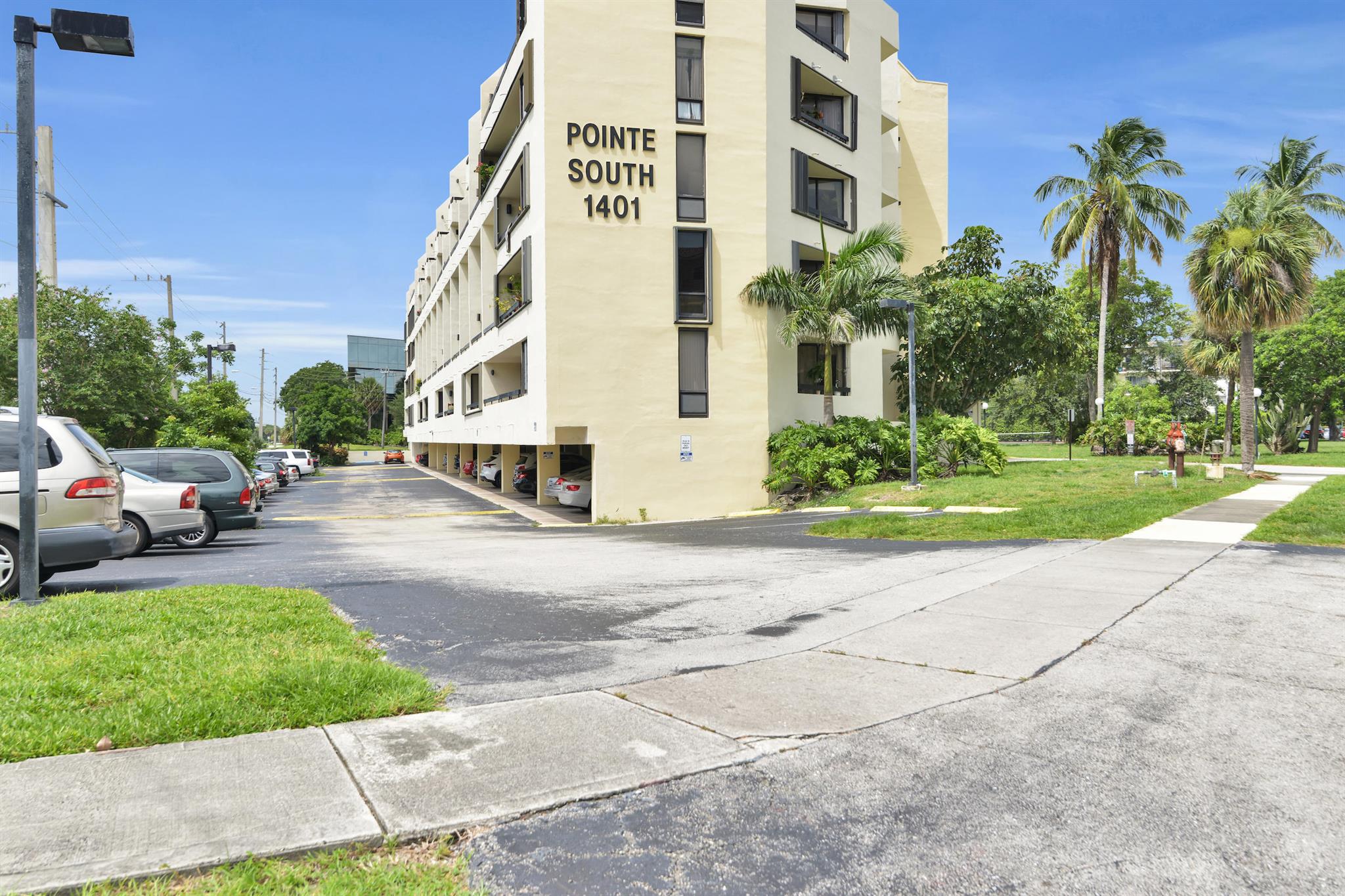 Renovated split 2-bedroom, 2-bath condo featuring an open kitchen with stainless steel appliances and elegant cherry cabinetry. The bathrooms have been updated. Enjoy the sunshine on a south-facing balcony, accessible from both the living room and main bedroom. The spacious guest bedroom offers a second balcony. While the unit doesn't have an in-built washer and dryer, there's a community laundry right below in the garage level. Assigned garage space with additional parking for guests. There's also convenient storage included. Located in a quiet building in the trendy downtown Boca area.