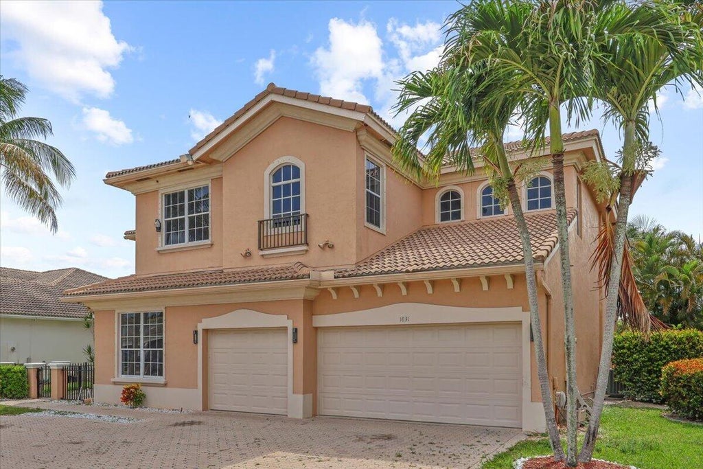 Photo of 1831 Waldorf Drive, Royal Palm Beach, FL 33411 (MLS # B26036421)