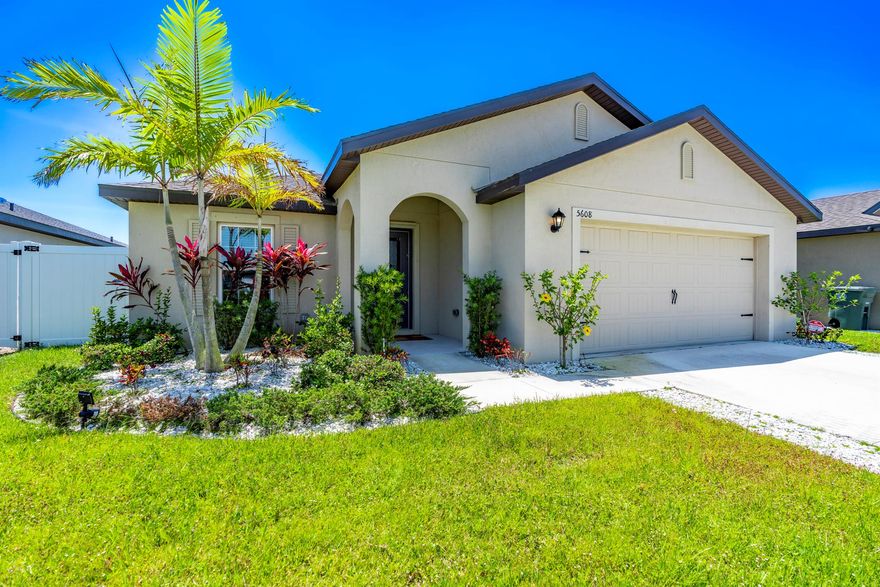 PRICED TO SELL!  Hurry before its sold. 
Welcome to this nearly new home.  It's 2 years new.  Priced below new construction. Ready to go. 
Faux Plank Laminate in living areas and bathrooms and comfort carpet in the bedrooms.  
Fence in Yard, with Covered Patio.
This home is positioned in an affordable HOA with community pool and playground.