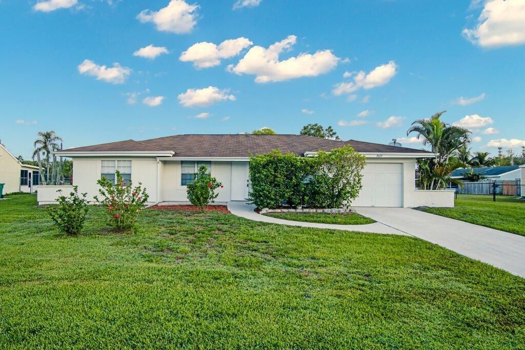 Photo of 2022 SE Oxmoor Terrace, Port Saint Lucie, FL 34952 (MLS # R10968410)