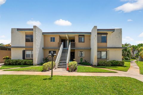 Photo of 1551 NE 13th Ter #A14, Jensen Beach, FL 34957 (MLS # F10518338)