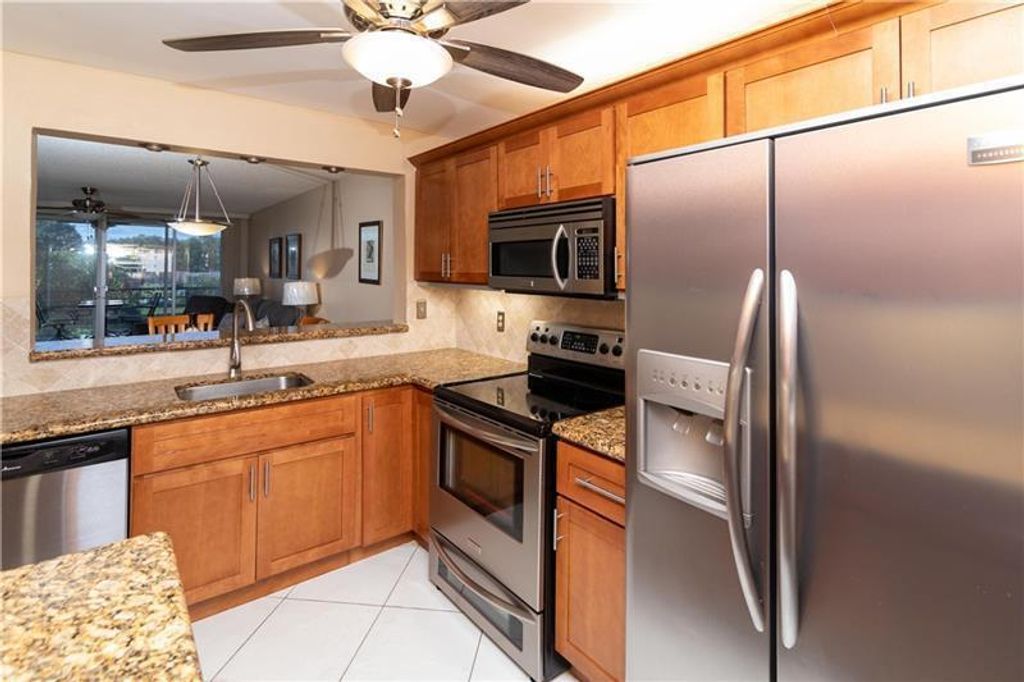 Photo of 1811 Sabal Palm Drive #304, Davie, FL 33324 (MLS # B26019383)