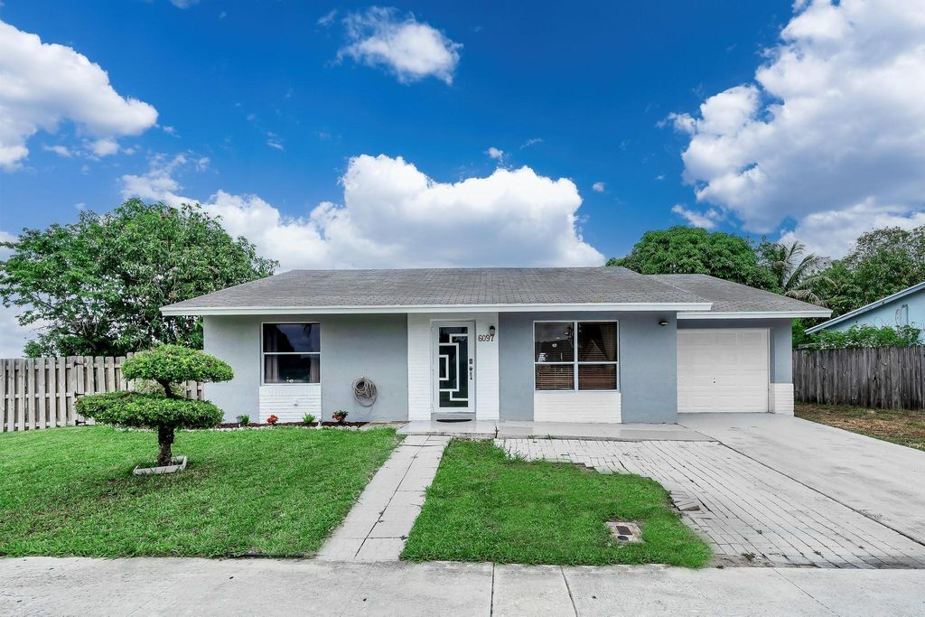 Photo of 6097 Blue Stone Lane, Lake Worth, FL 33463 (MLS # F10515860)