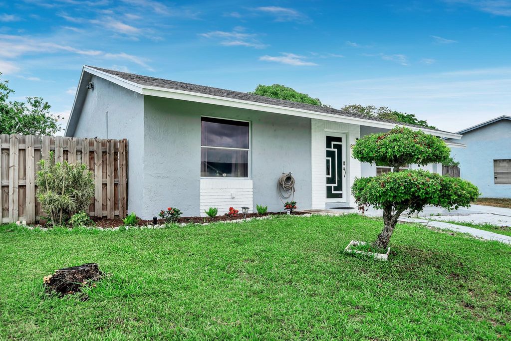 Photo of 6097 Blue Stone Lane, Lake Worth, FL 33463 (MLS # F10515860)