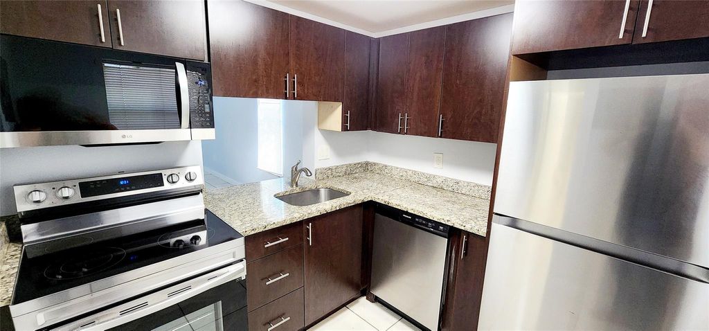 Photo of 2800 NW 56th Avenue #E107, Lauderhill, FL 33313 (MLS # F10478452)