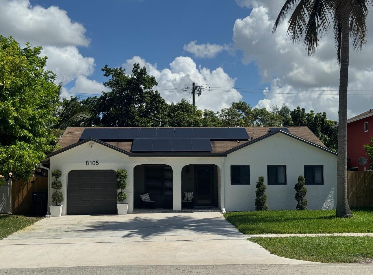 **Stunning Remodeled Home with Modern Amenities** Welcome to your dream home! This beautifully remodeled residence boasts 3 spacious bedrooms and 2 luxurious bathrooms, including a master suite designed for relaxation and comfort. Entertain effortlessly in the stylish bar area, perfect for gatherings with family and friends. With energy efficiency in mind, this home features solar panels to help reduce your utility costs. For electric vehicle owners, an electric car charger is ready and waiting. Outside, you'll find a generous backyard, ideal for outdoor activities, gardening, or simply enjoying the fresh air. Roof 2016, impact garage door 2016, tankless hot water 2020, solar panels 2022, driveway & impact windows 2025.