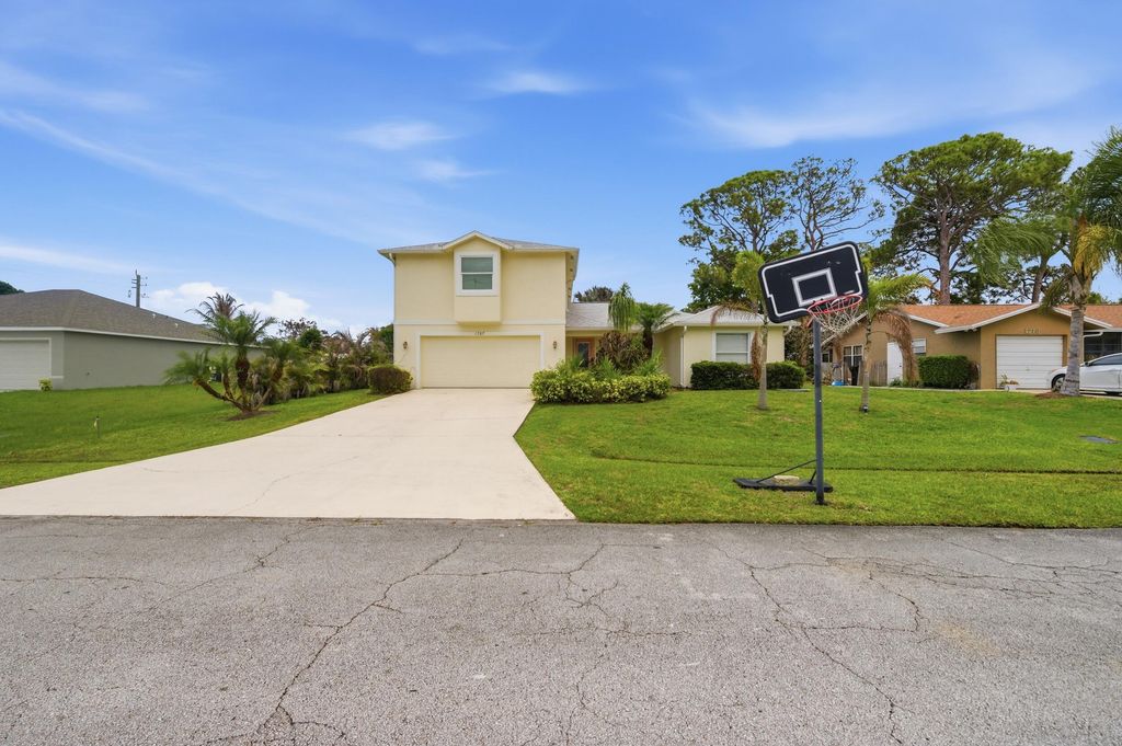Photo of 1707 SE Manth Lane, Port Saint Lucie, FL 34983 (MLS # B26017910)