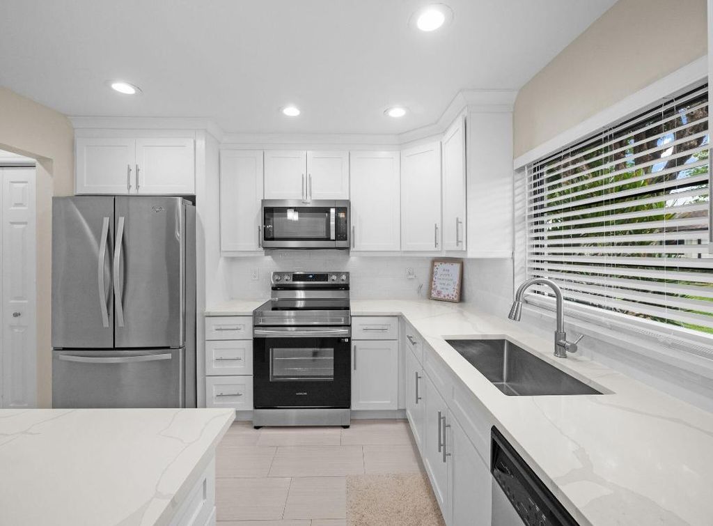 Photo of 4751 Storkwood Way #B, Boynton Beach, FL 33436 (MLS # R11124522)