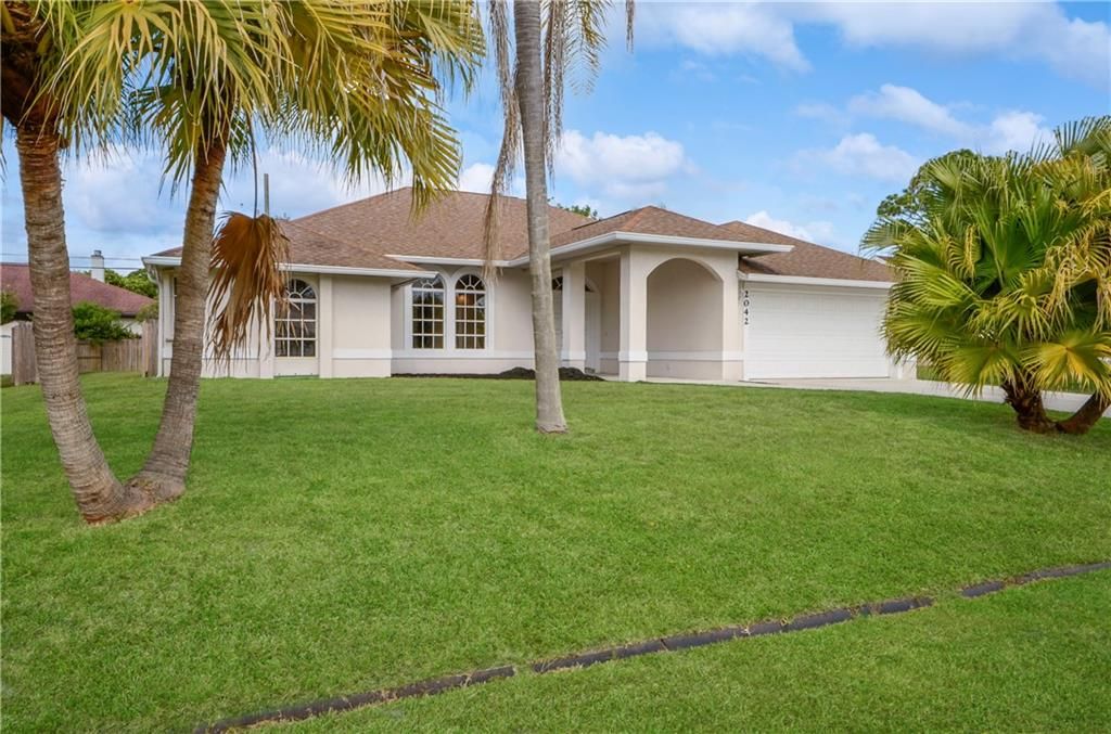 Photo of 2042 SW Capeador St, Port Saint Lucie, FL 34953 (MLS # F10345455)