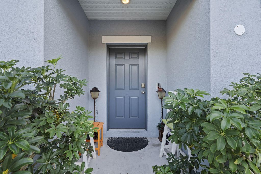 Photo of 1414 SW Crest Avenue, Port Saint Lucie, FL 34953 (MLS # R11147414)