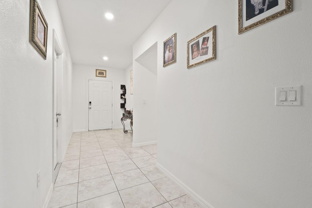 Photo of 1414 SW Crest Avenue, Port Saint Lucie, FL 34953 (MLS # R11147414)