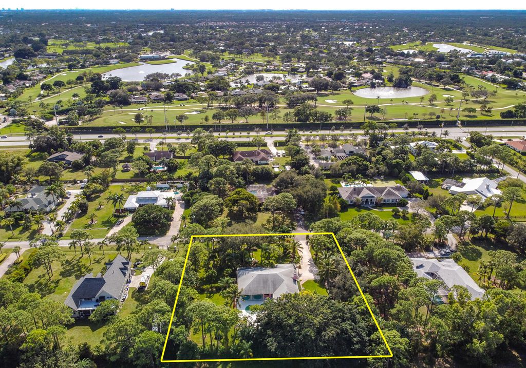 Photo of 6599 140th Lane N, Palm Beach Gardens, FL 33418 (MLS # R11144095)