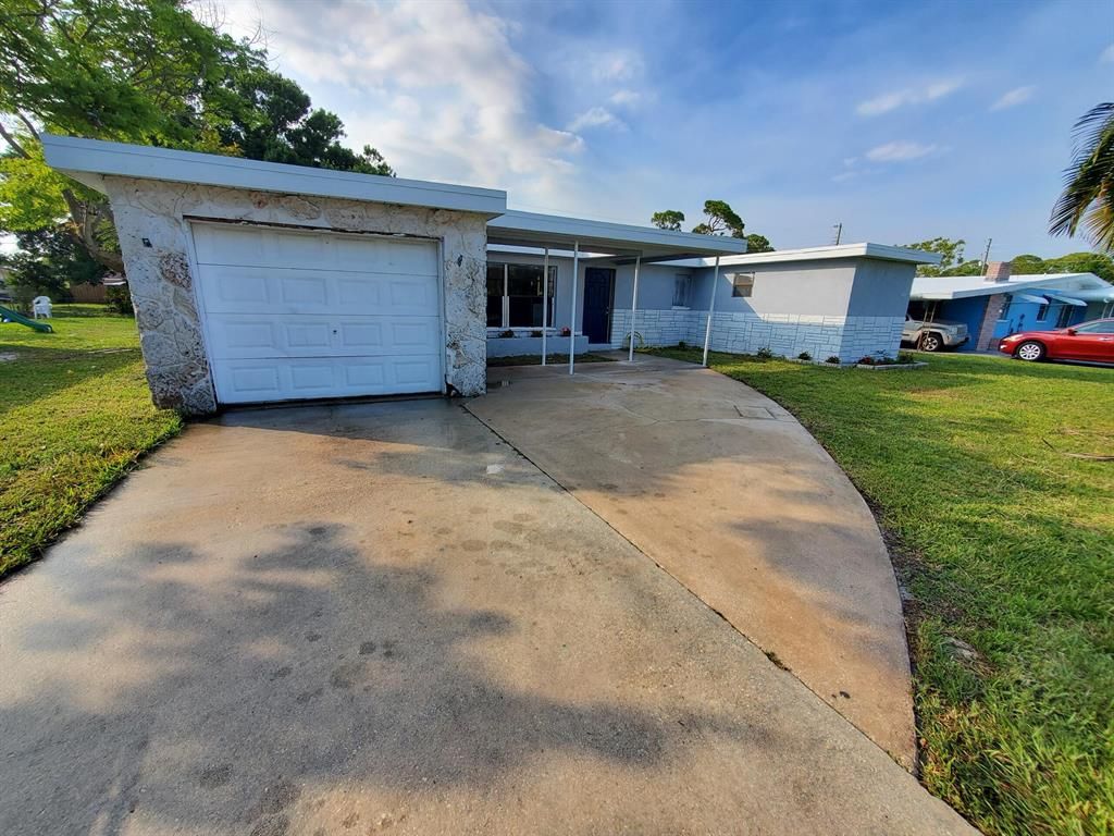 Photo of 328 Shady Lane, Port Saint Lucie, FL 34952 (MLS # R10702490)