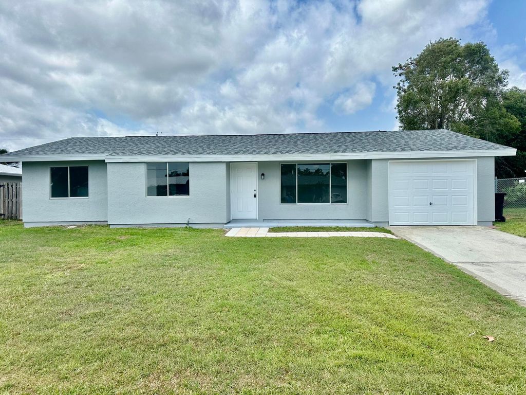 Photo of 2342 SE Shelter Drive, Port Saint Lucie, FL 34952 (MLS # R10986899)