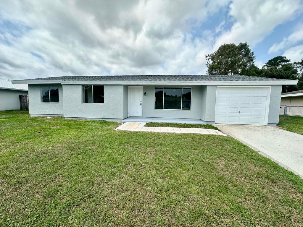Photo of 2342 SE Shelter Drive, Port Saint Lucie, FL 34952 (MLS # R10986899)