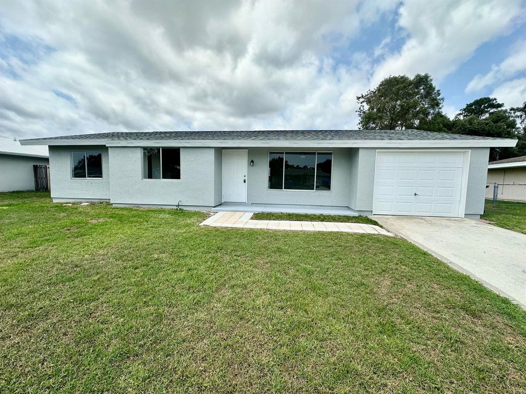 Photo of 2342 SE Shelter Drive, Port Saint Lucie, FL 34952 (MLS # R10986899)