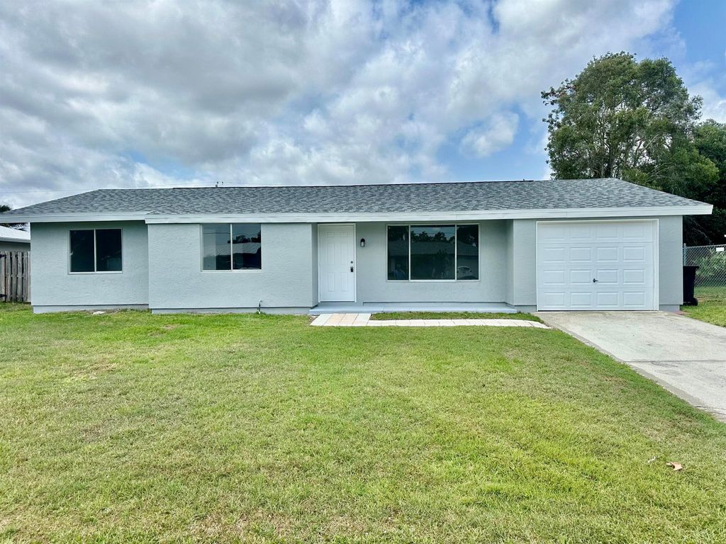 Photo of 2342 SE Shelter Drive, Port Saint Lucie, FL 34952 (MLS # R10986899)