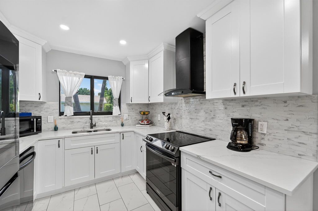 Photo of 1325 NW 23rd Lane, Delray Beach, FL 33445 (MLS # R11136338)