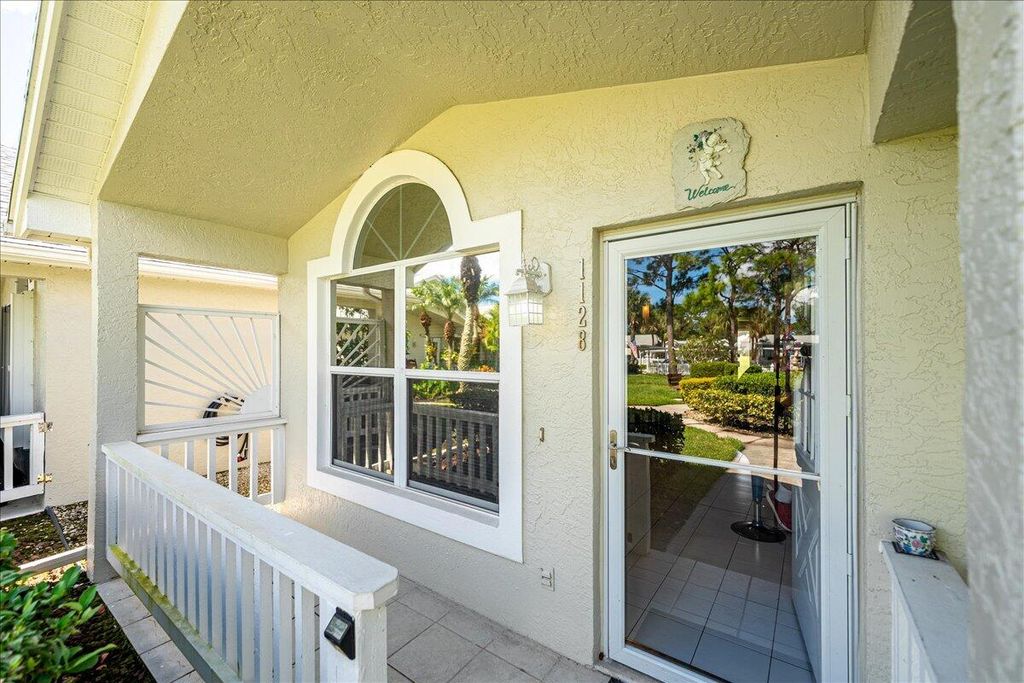 Photo of 1128 NW Lombardy Drive, Port Saint Lucie, FL 34986 (MLS # R11132616)