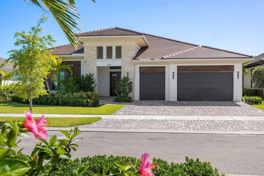 Photo of 9232 Coral Isles Circle, Palm Beach Gardens, FL 33412 (MLS # R11070761)