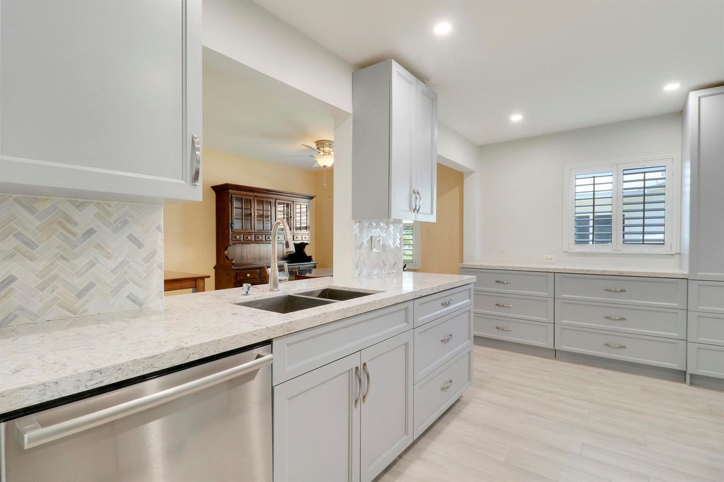 Photo of 1703 SW 22nd Way, Boynton Beach, FL 33426 (MLS # R11094558)