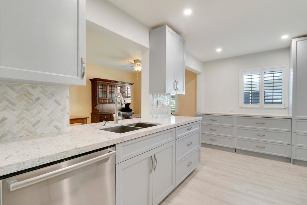 Photo of 1703 SW 22nd Way, Boynton Beach, FL 33426 (MLS # R11094558)
