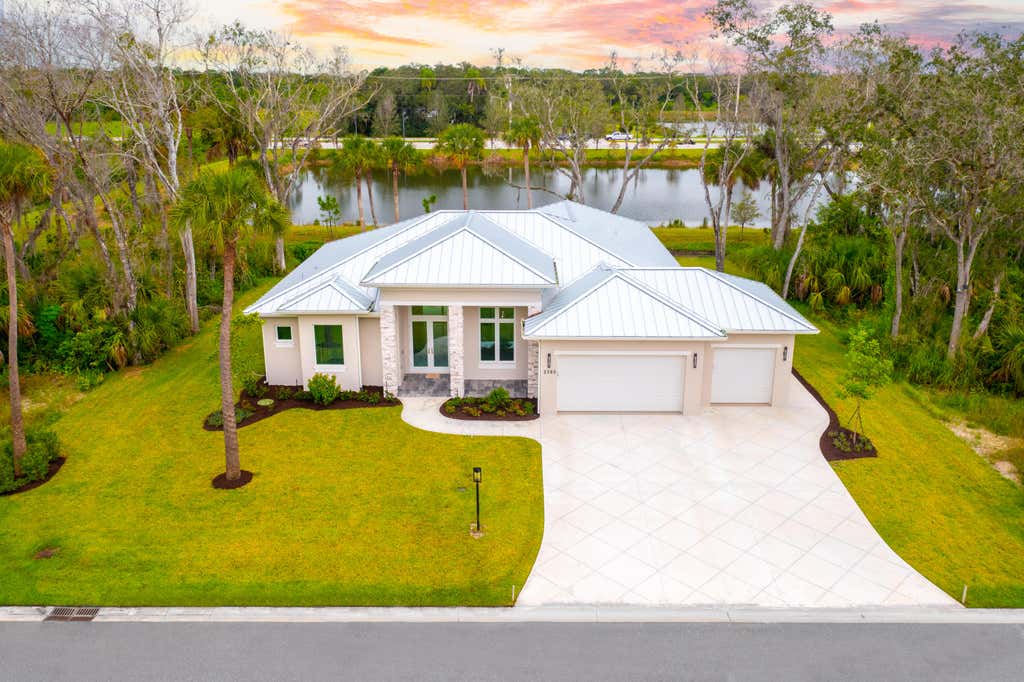Photo of 2380 Noble Oaks Lane, Fort Pierce, FL 34981 (MLS # R10995603)