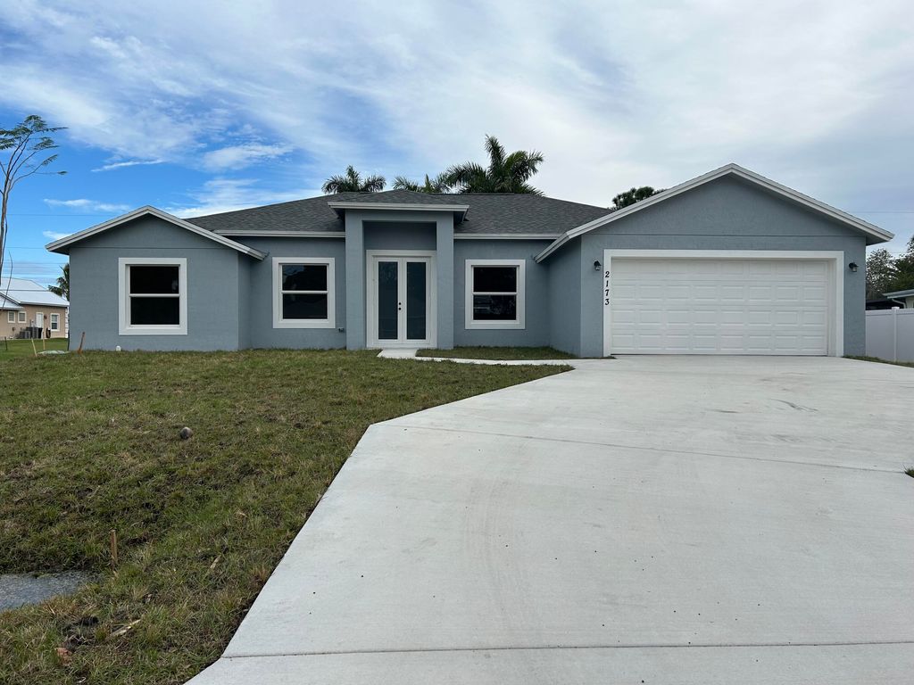 Photo of 1189 SW Khan Drive, Port Saint Lucie, FL 34953 (MLS # R10957657)