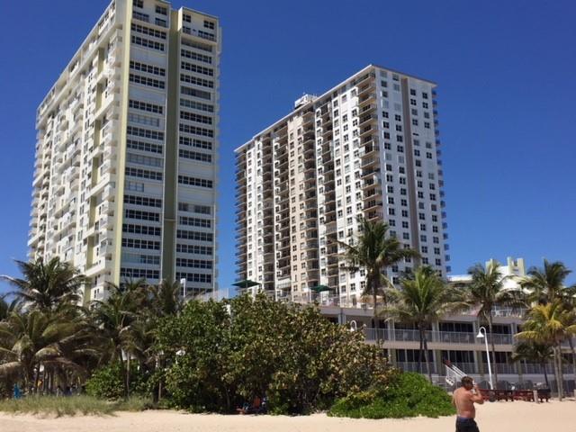 Stunningly beautiful 2 bedroom/2 full bath unit comes beautifully furnished & turnkey. Newer stainless steel appliances, oak cabinetry with granite countertops in kitchen, porcelain tiles with wood look throughout the unit. Just steps away from the multi-million dollar Recreation Center on the beach, featuring two pools, two state of the art exercise rooms, bar tended lounge/bottle club, billiard/pool room, card rooms, lounges, shuffleboard, BBQ's on the beach, dining cafe and so much more!! Short walk to new Fisher Family fishing pier and many new restaurants and shops.
