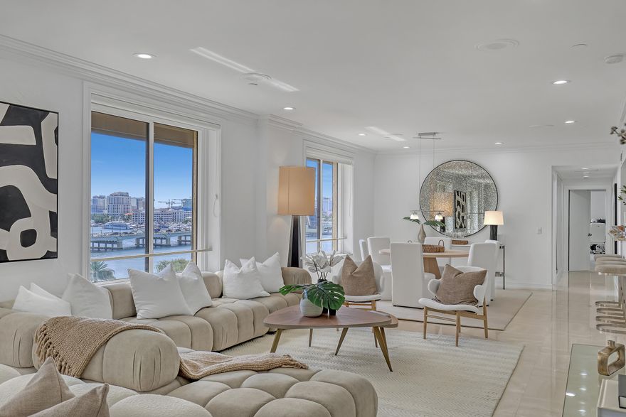 This spacious over 1800 sf, potential 3 bedroom residence at the iconic PB Biltmore offers sweeping views of the Intracoastal Waterway & lush courtyard gardens. Updated with new impact windows, the home is bathed in warm southern light throughout the day and sunset views.The open-concept living and kitchen areas are perfect for both relaxing and entertaining, while the generous primary suite provides a tranquil retreat w/ water views. Easily add a den or third bedroom to the oversized living space. A 2 BR condo next door is also available  Enjoy five-star service alongside the ultimate in-town convenience, with walking access toshopping, fine dining & beach. An unparalleled array of amenities, incl the hidden gem, a private oceanfront club with dining and beach access. Pet friendly too