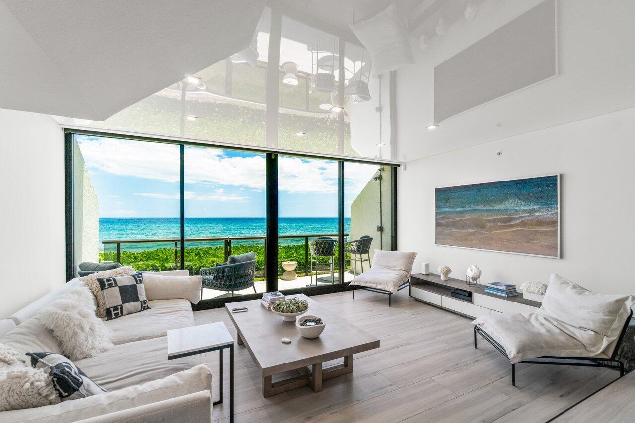 Beyond exquisite and calling those who appreciate only the finest. This exclusive and rare direct oceanfront designer renovated townhome is the definition of coastal luxury. Airy, light and bright, this 3 bedroom/2.5 bath, 3 level home underwent a total renovation, completed in 2022, with no detail overlooked and only the finest materials and craftsmanship used. Every aspect has been luxuriously touched with a designer's eye and updated to state-of-the-art. Feeling like a new construction single family home and coupled with with benefit of condo amenities, you will receive access to the Ocean Terrace fitness club, refurbished pool and pool deck, club room and private beach access directly out you back door.