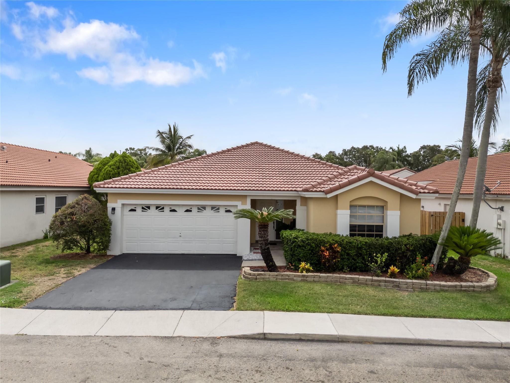 OPEN & AIRY FLOOR PLAN IN T HIS 3 BEDROOM 2 BATH WITH 2 CAR GARAGE WITH BRAND NEW S-TILE ROOF
MARCH 2025, NEW CENTRAL AC 2023, NEW WATER HEATER 2023, VAULTED CEILINGS, LARGE MASTER SUITE WITH ROMAN TUB, OPEN
KITCHEN TO FAMILY ROOM, LARGE NEWLY FENCED YARD ALL RECENTLY LANDSCAPED, GREAT FOR CHILDREN & PETS, LOCATED
IN DESIRABLE SAWGRASS MILLS. Within walking distance of an award-winning elementary school
? 5-minute driving proximity to I-595, I-75 and Sawgrass Expressway making
it easy to “get on the road”
? Flamingo Park within walking distance upgraded
? 5-minute drive to one of the largest shopping malls in Florida including
many new dining options
? Common area for all residents to use which includes 2-mile long, paved
pathways for walking, jogging, bike-riding or blading