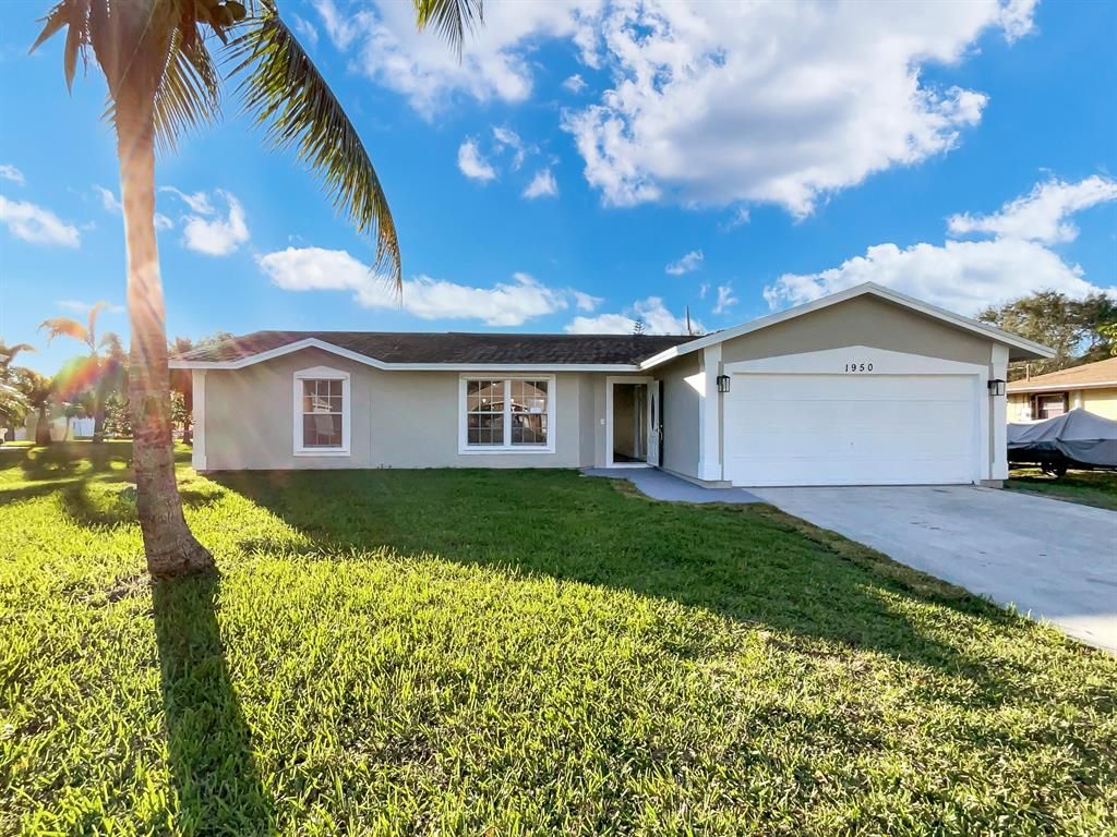 Photo of 1950 SW Capeador Street, Port St Lucie, FL 34953 (MLS # R10854555)