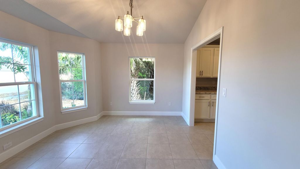 Photo of 8844 Waterstone Boulevard, Fort Pierce, FL 34951 (MLS # B26008159)