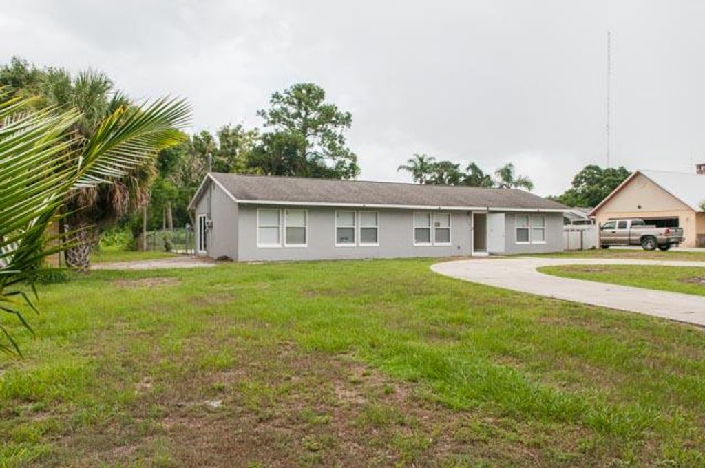 Photo of 3748 Whiteway Dairy Road, Fort Pierce, FL 34947 (MLS # R11005199)