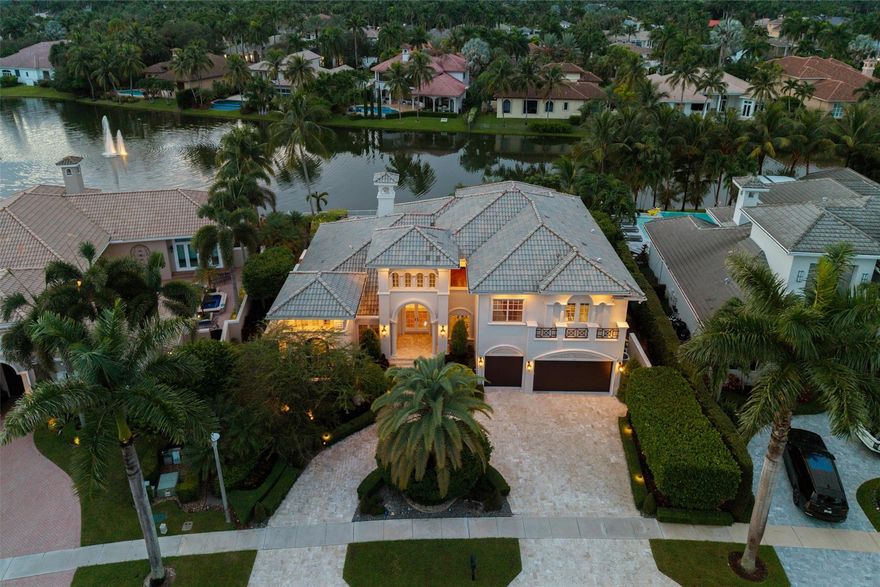 LOCATION LOCATION LOCATION! DON'T MISS THIS SPECTACULAR WATERFRONT CUSTOM ESTATE W 6 BEDROOMS IN THE SOUGHT AFTER INNER LOOP OF HAWKS LANDING! LOVINGLY MAINTAINED & FRESHLY PREPARED FOR MARKET, THIS SPECIAL PROPERTY FEATURES A SUMPTUOUS PRIMARY SUITE, 2 EN-SUITE BEDROOMS + OFFICE ON THE FIRST LEVEL W 3 EN-SUITE BEDROOMS AND LIVING ROOM UPSTAIRS*LUXURY FEATURES & FINISHES INCLUDE NEWLY PAINTED EXTERIOR & INTERIOR* FIREPLACE *ELEVATOR*IMPACT GLASS* MARBLE & WOOD FLOORING* CHEF'S KITCHEN W LARGE CENTER ISLAND* MARBLE CIRCULAR DRIVEWAY*GENERATOR*VANISHING EDGE HEATED POOL/SPA W HUGE COVERED AREA FOR DINING AL FRESCO W MOTORIZED SCREENS & A CUSTOM PERGOLA MAKES OUTDOOR LIVING & ENTERTAINING A DELIGHT* THIS ONE OF A KIND RESIDENCE COMBINES LUXURY, FUNCTIONALITY AND AN UNBEATABLE LOCATION!