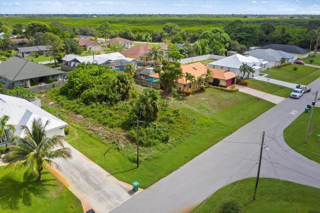 Photo of 765 SE Essex Drive, Port Saint Lucie, FL 34984 (MLS # R10923963)