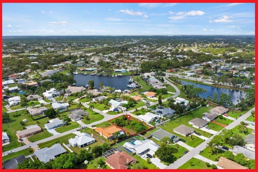 Photo of 765 SE Essex Drive, Port Saint Lucie, FL 34984 (MLS # R10923963)